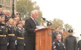 2012 Memorial Service - speaker at memorial service in the rain (2)
