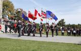 2014 Memorial Service - Officers with flags marching (1)
